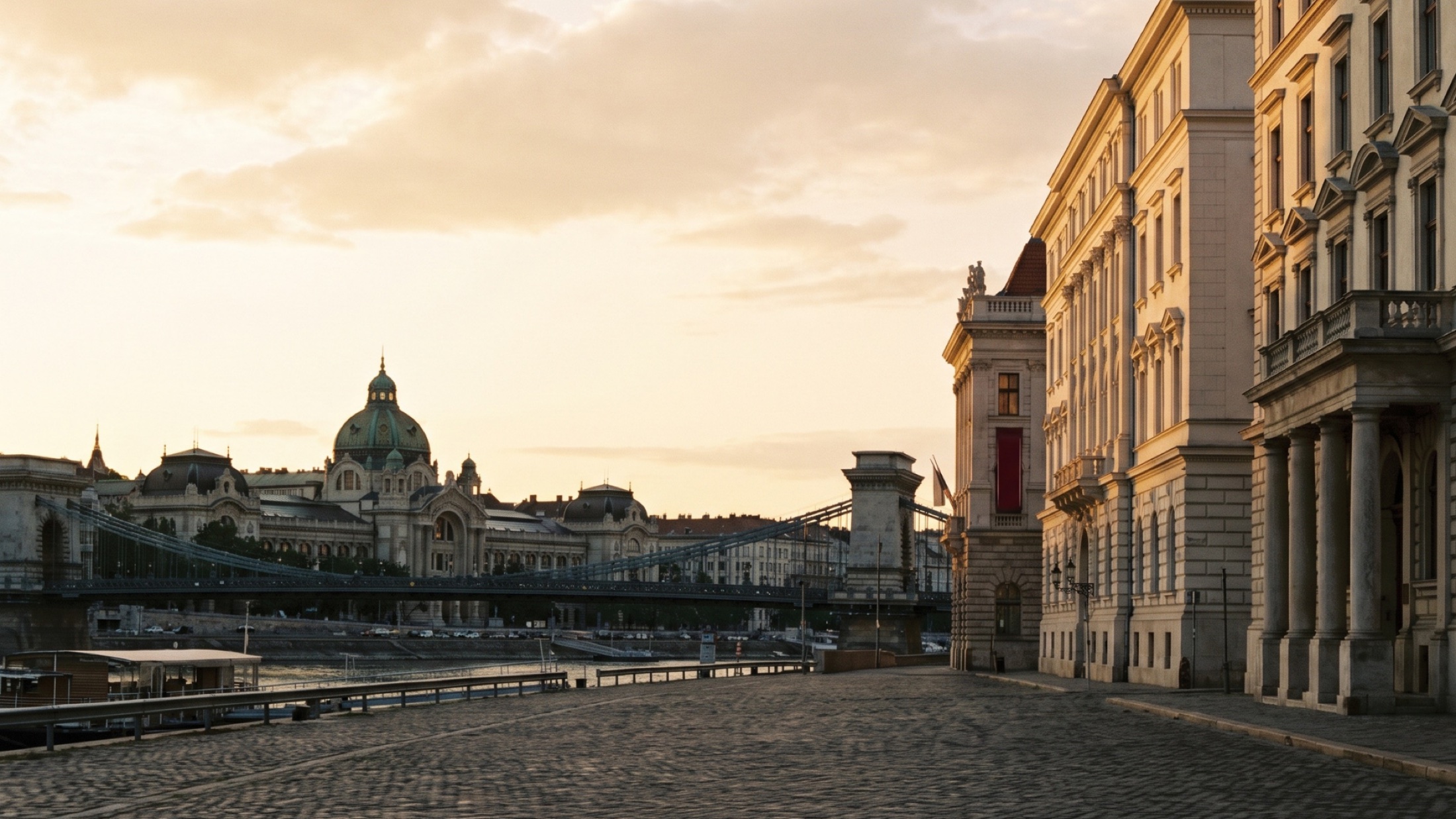 The Danube embankment in central Budapest at golden hour, close to the institute