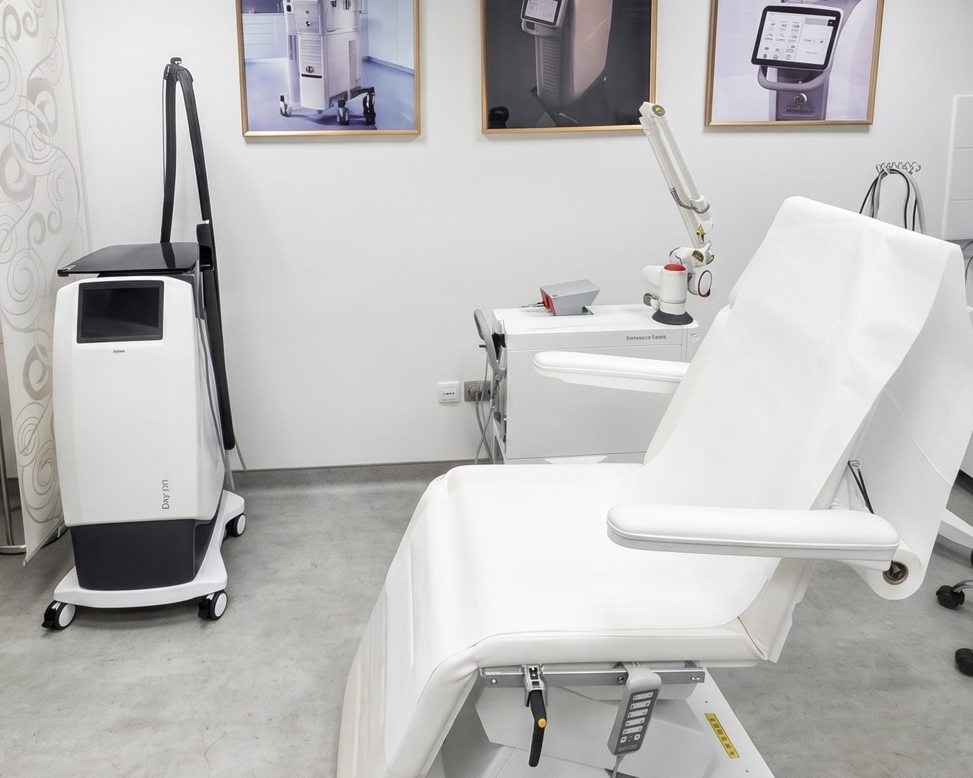 A procedure room with a laser system and a reclining treatment chair